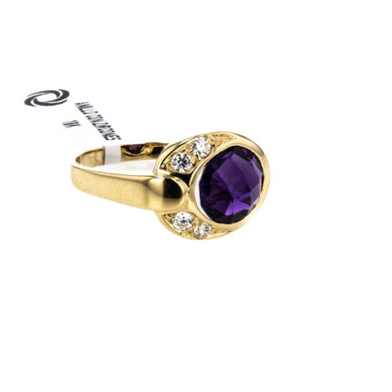 ANILLO CON ZIRCONES 18K
